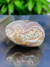 Crazy Lace Agate Palm Stone