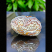 Crazy Lace Agate Palm Stone